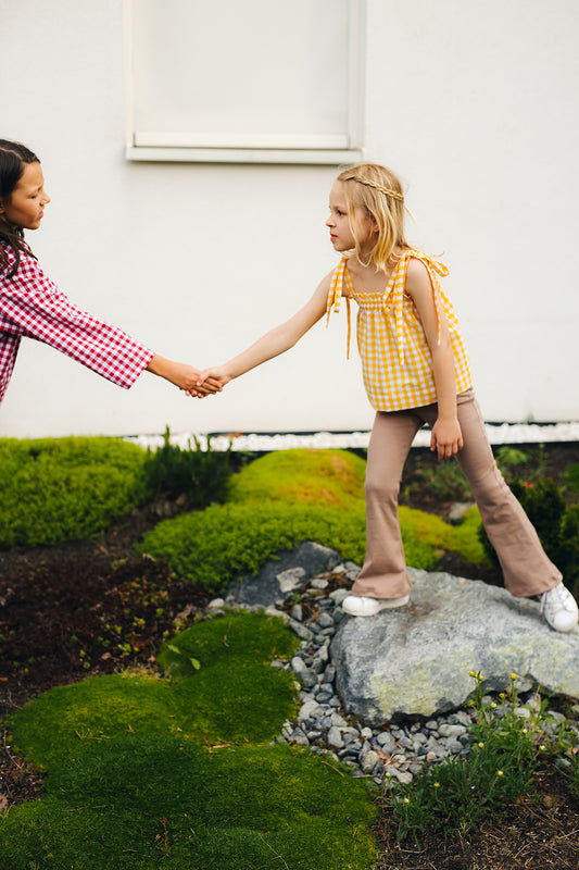 bluzka na wiązanych ramiączkach w biało-żółtą kratkę
