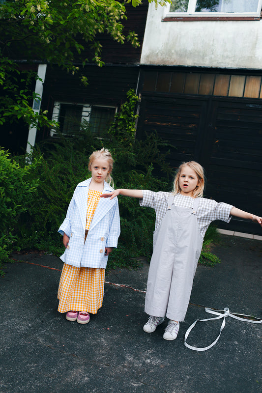 green dungarees with wide legs