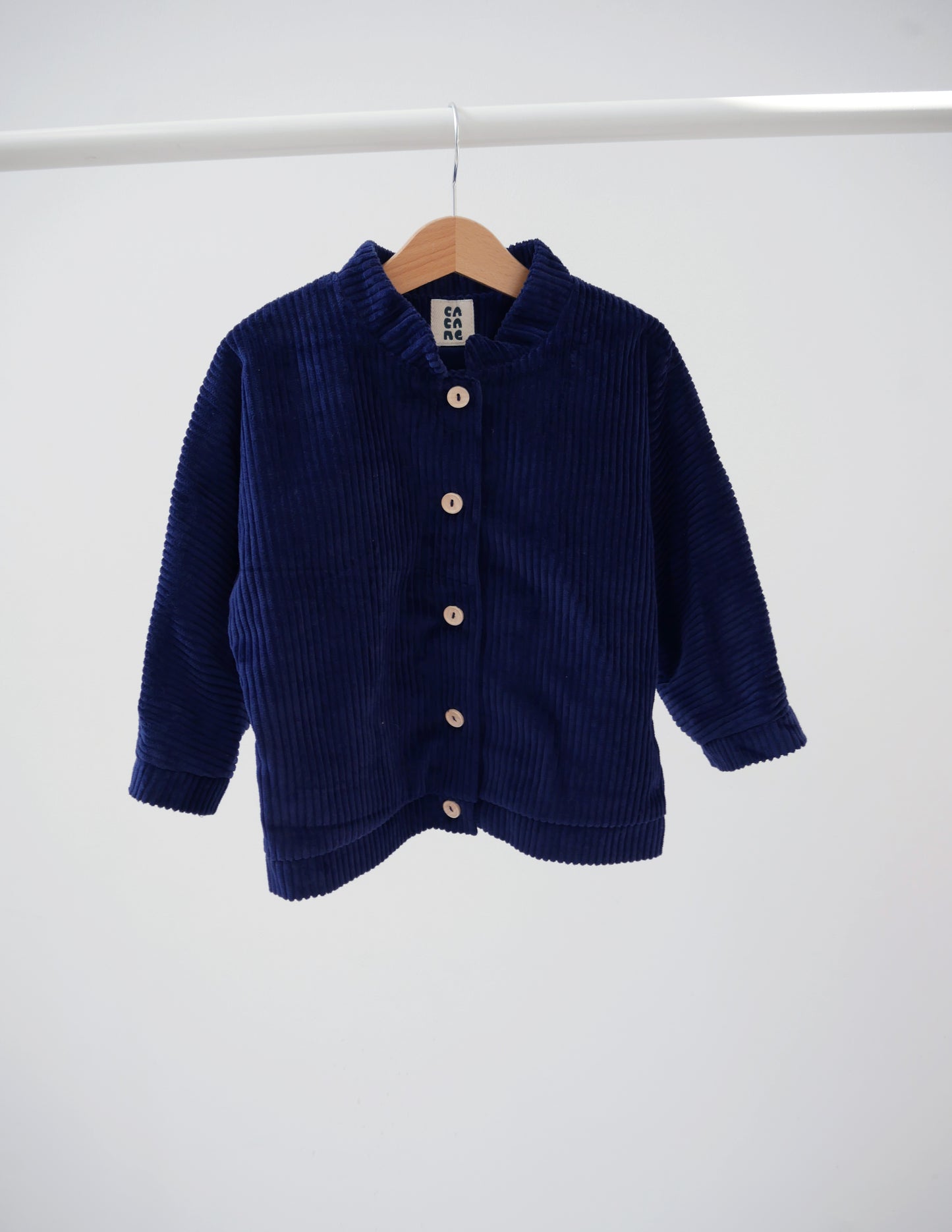 navy jacket from corduroy- cloth took part in photo session