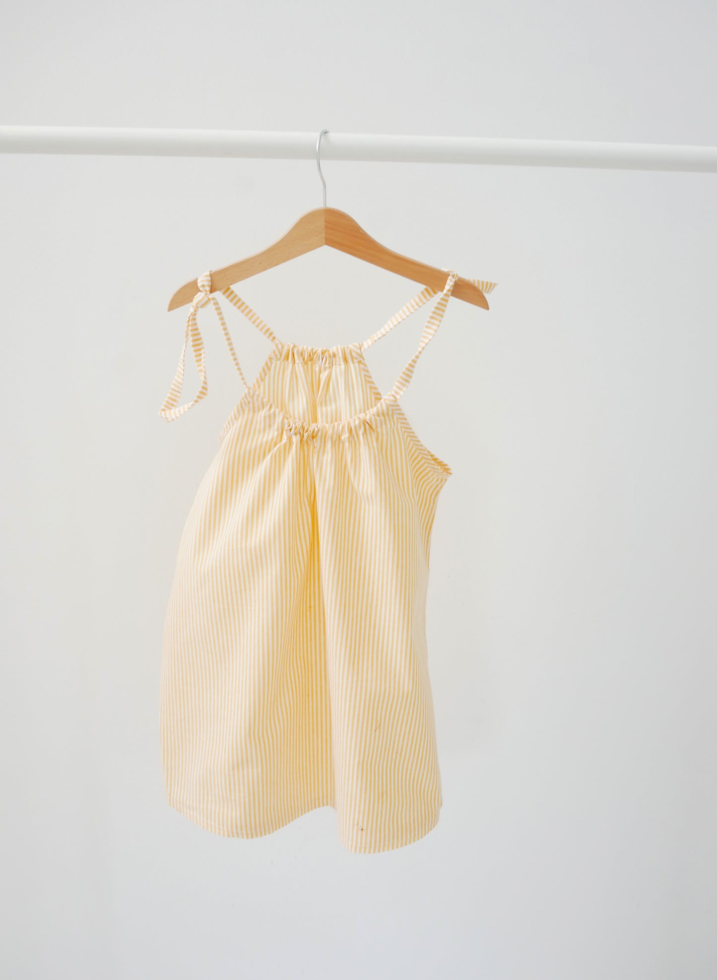 skirt/dress on adjustable straps with white and yellow stripes