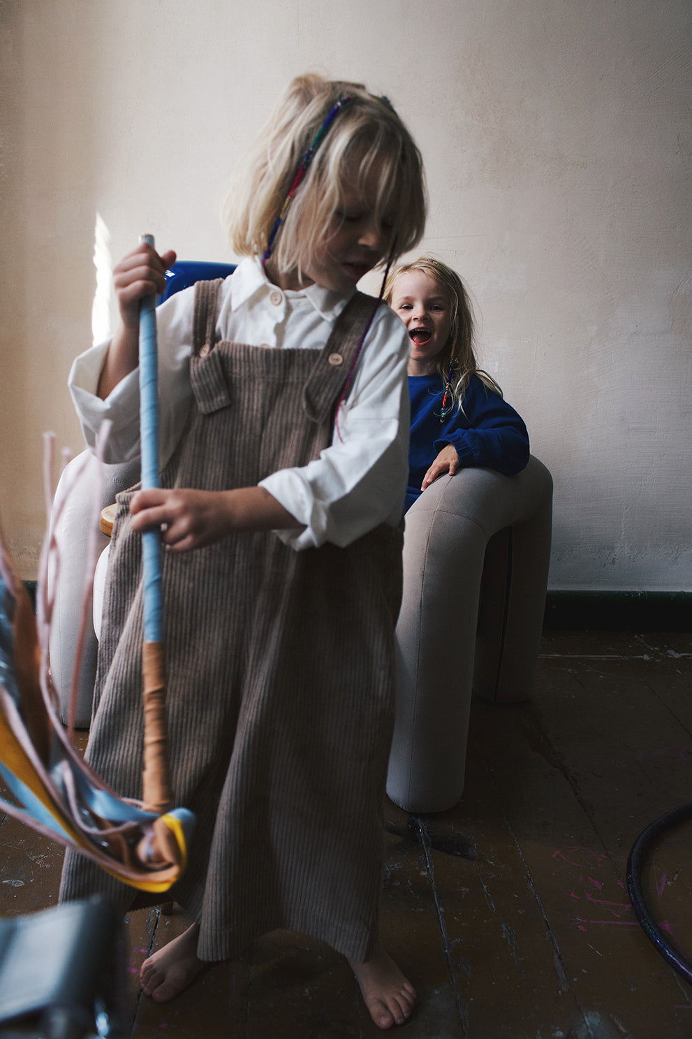 dark red dungarees with wide legs- cloth took part in photo session