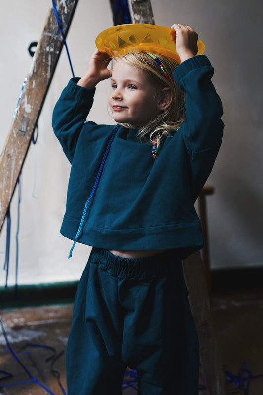 bottle green baggy trousers