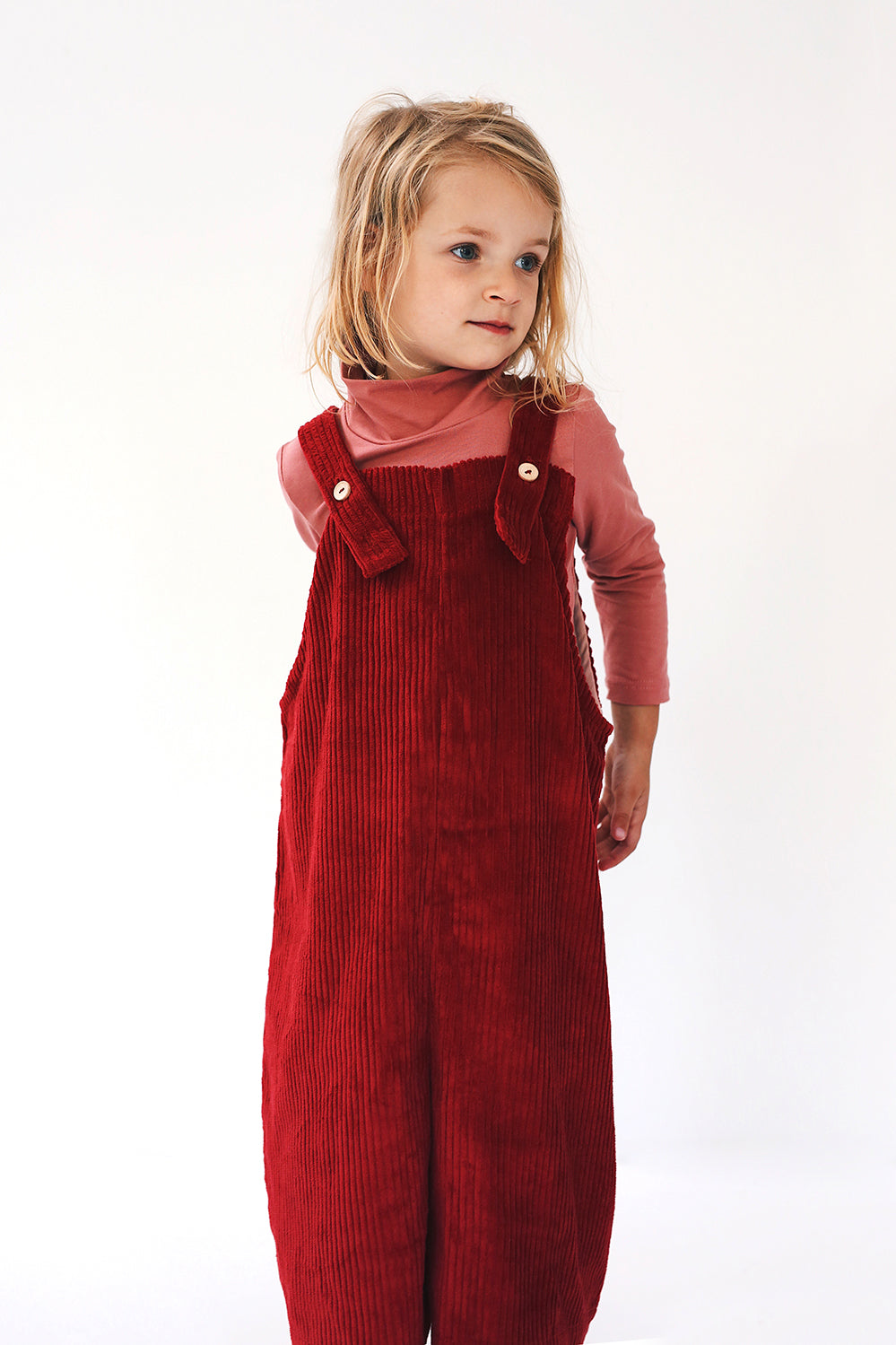 dark red dungarees with wide legs- cloth took part in photo session
