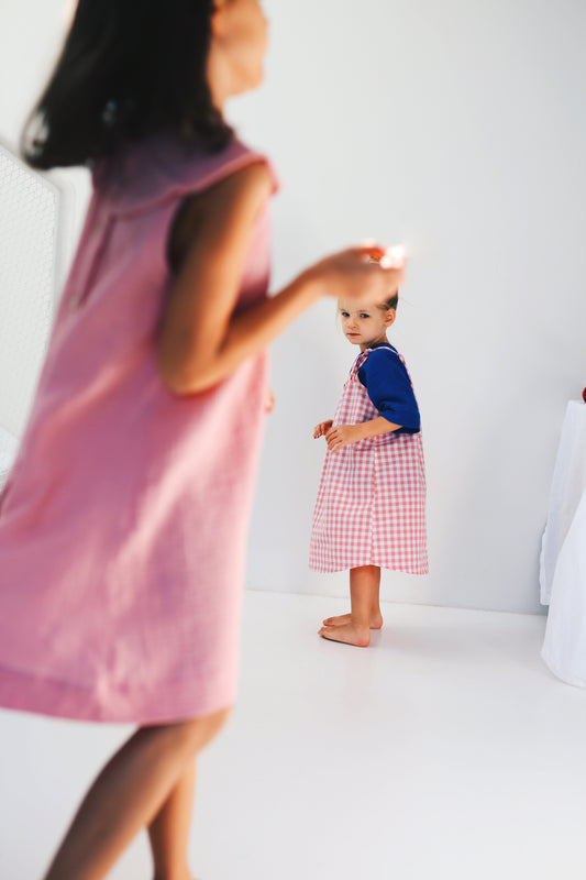 pink sleeveless dress with big round collar