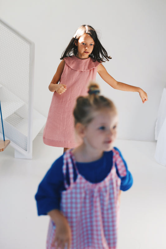 pink sleeveless dress with big round collar
