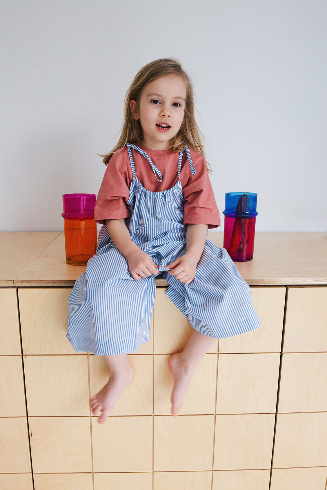 jumpsuit on straps, white and blue stripes