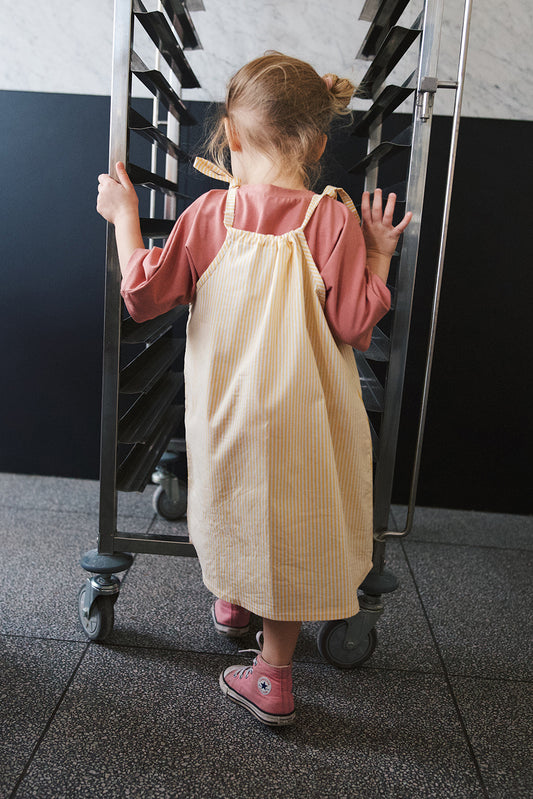 skirt/dress on adjustable straps with white and yellow stripes