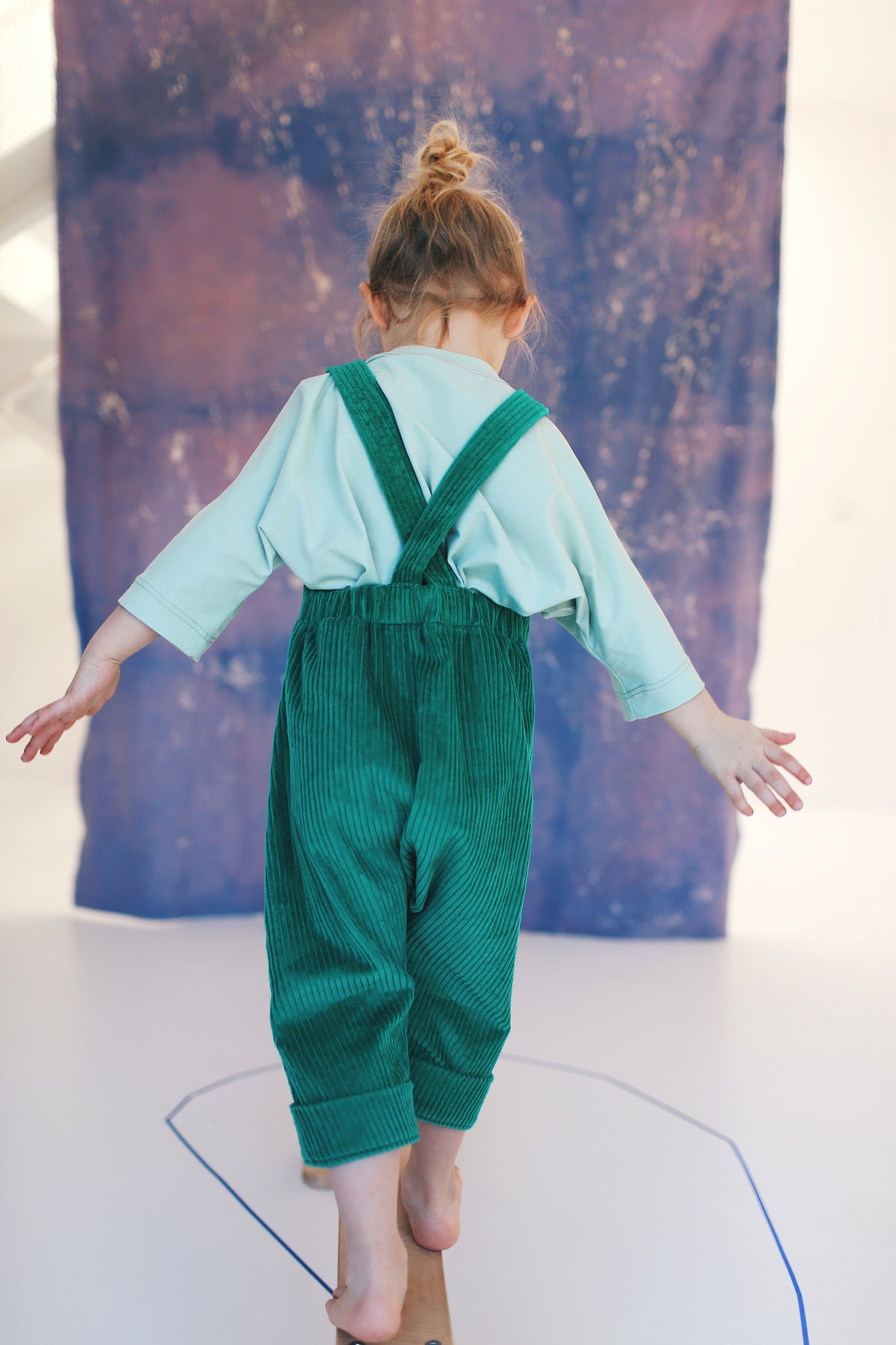 green dungarees