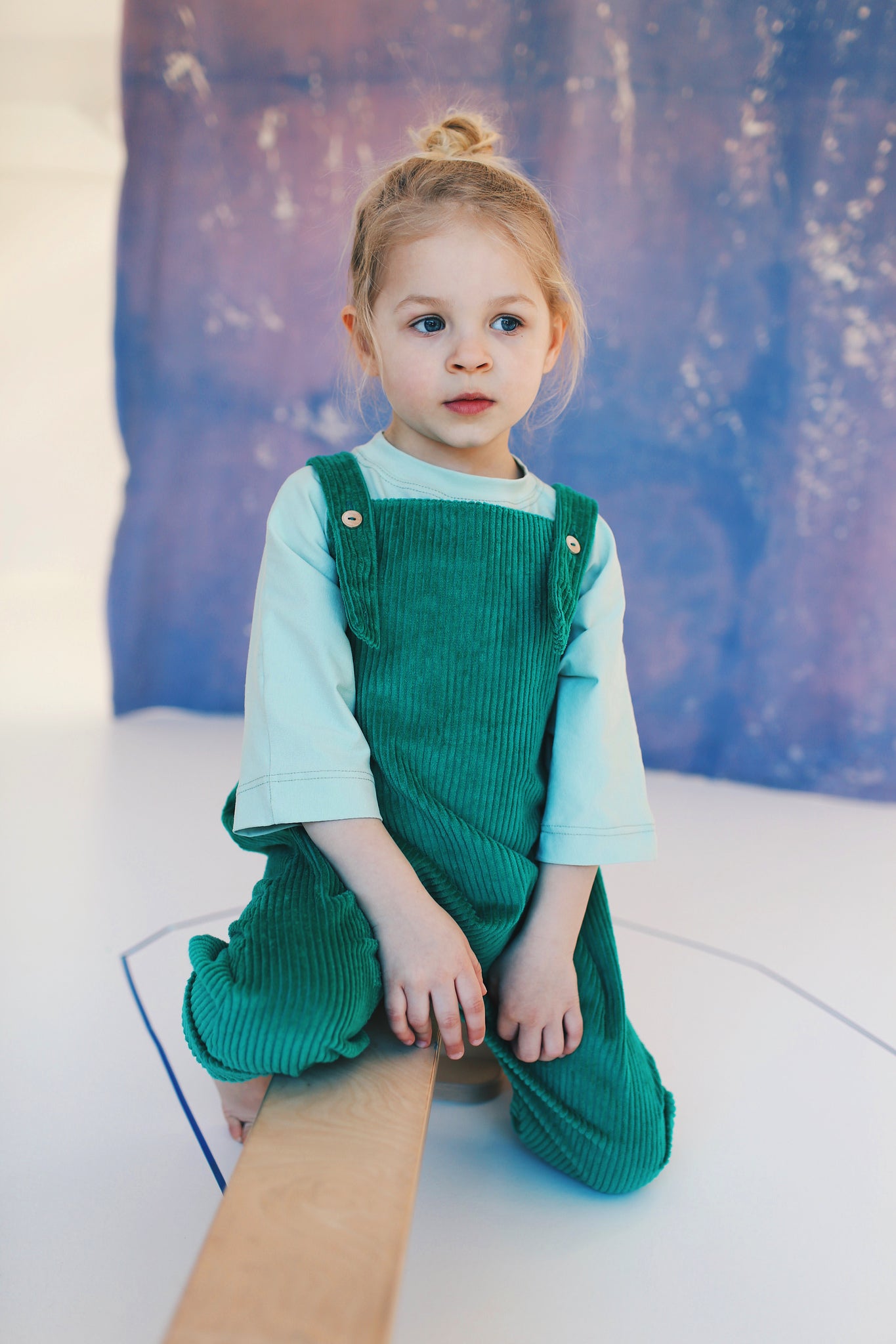 green dungarees