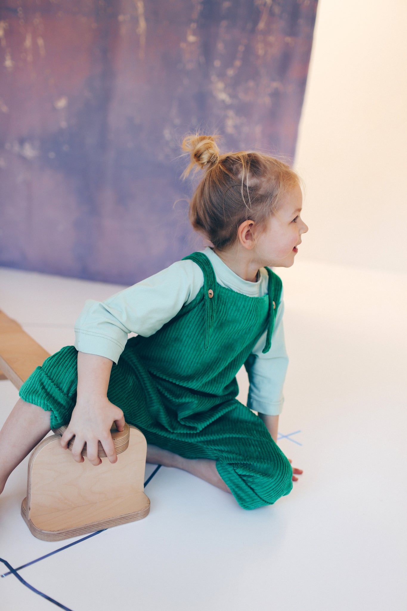 green dungarees