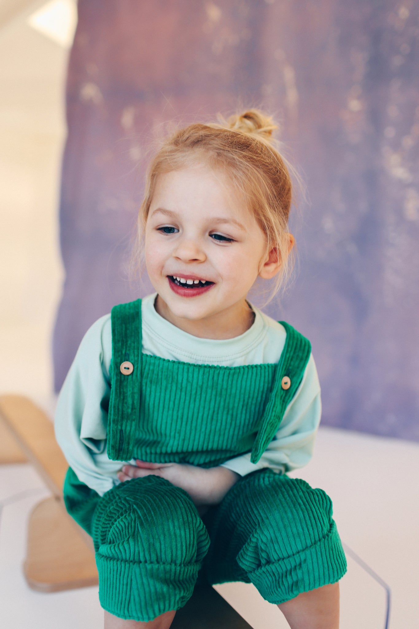 green dungarees