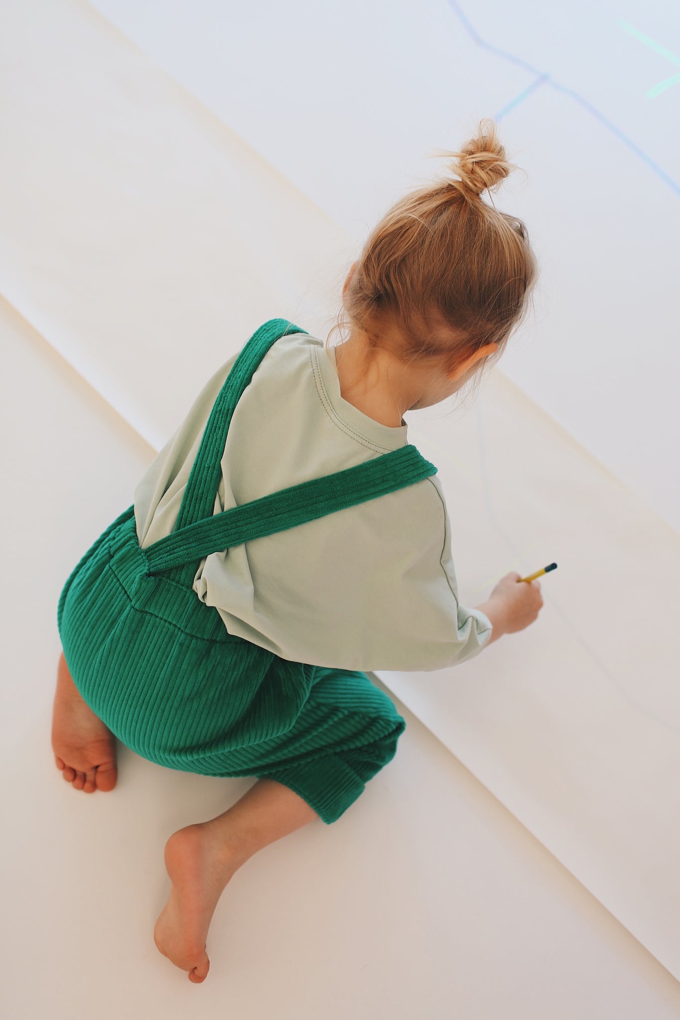 green dungarees