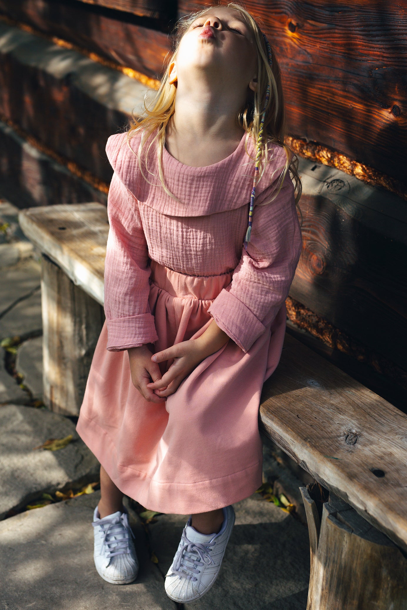 pink shirt with long sleeves with big round collar