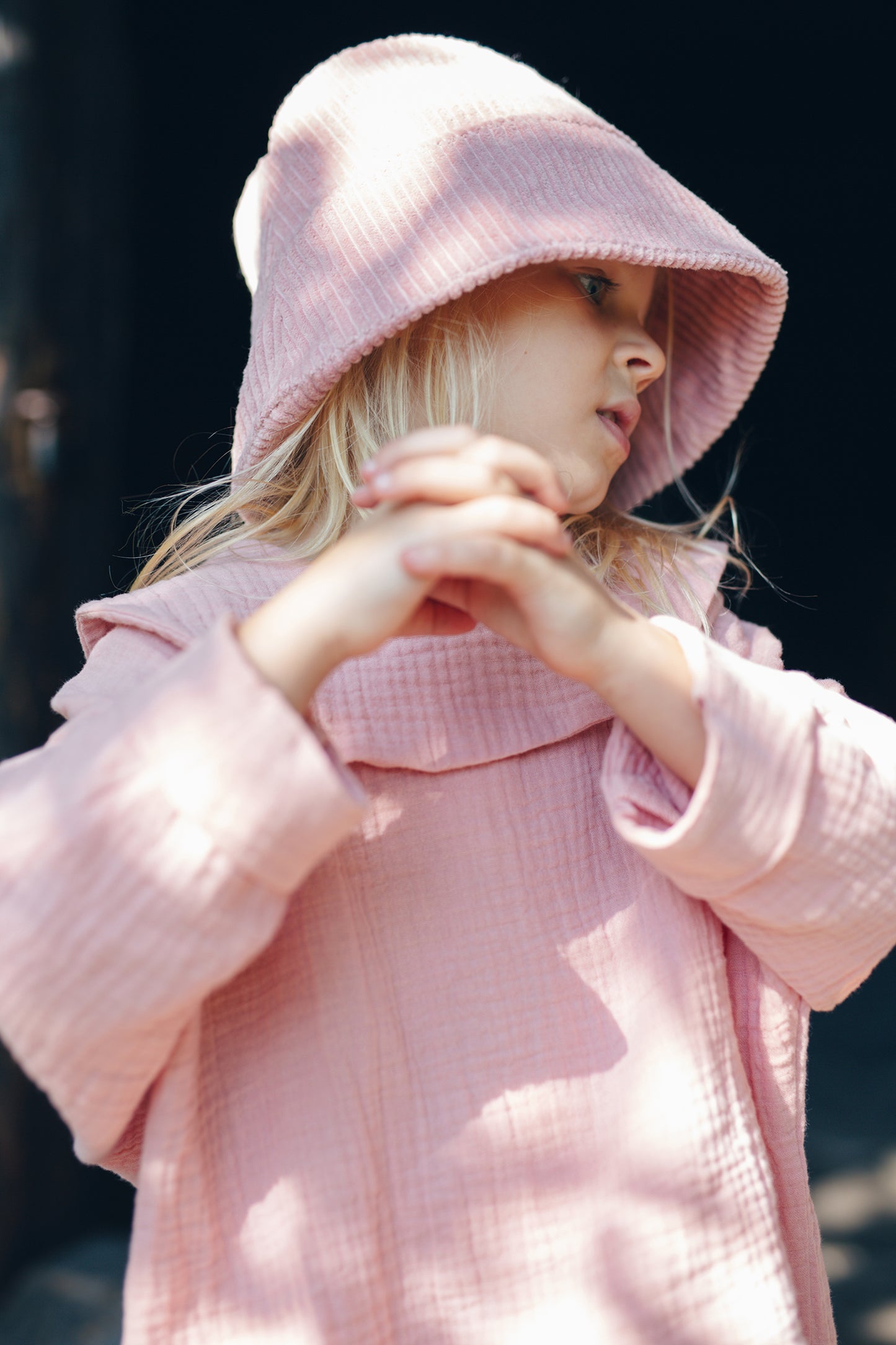 pink shirt with long sleeves with big round collar