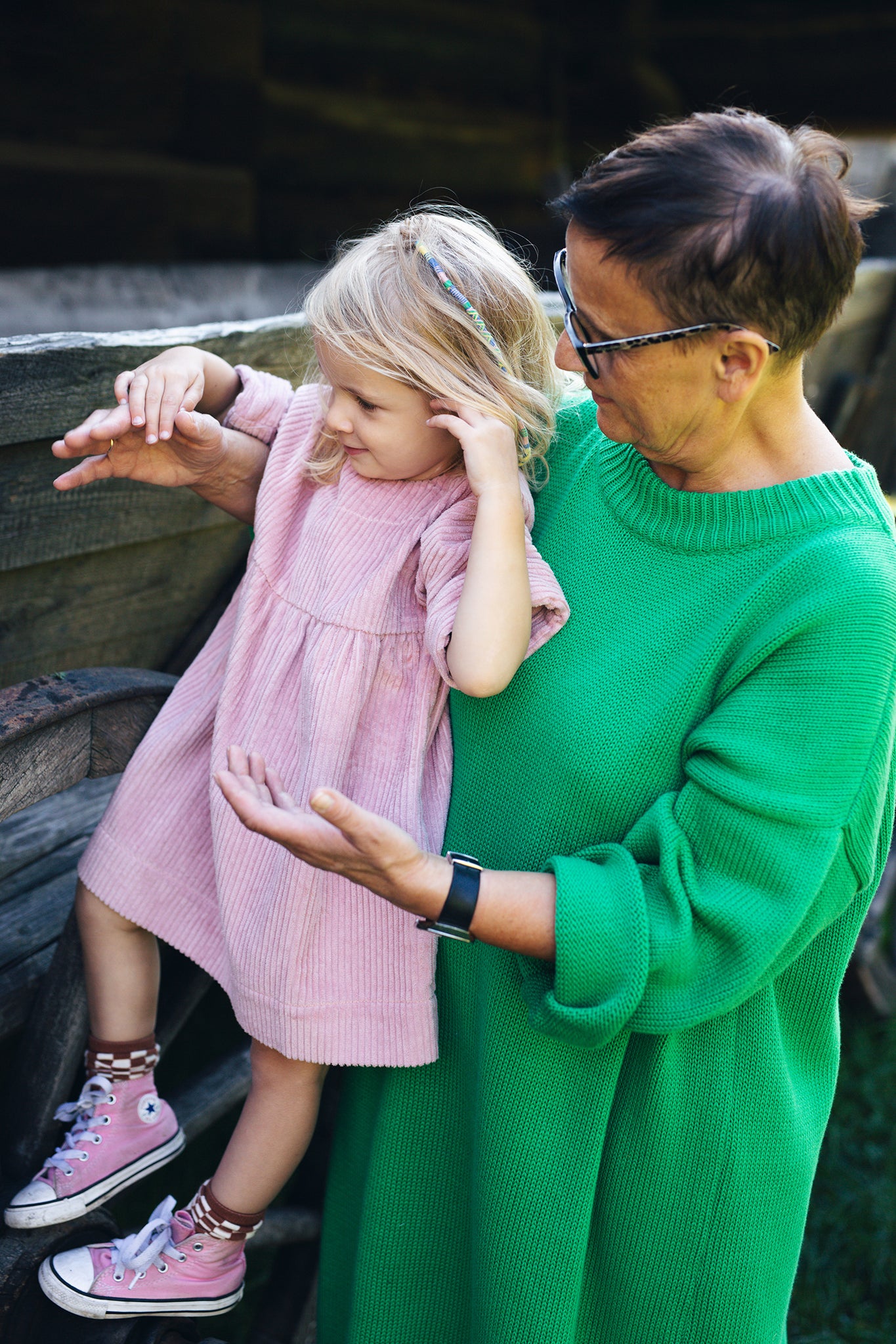 pink dress from corduroy with wooden buttons on the back