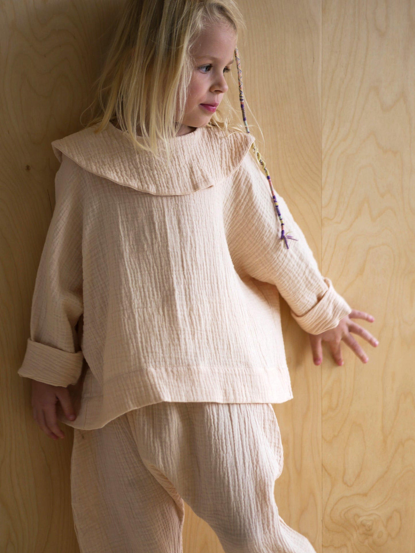 ecru shirt with long sleeves with big round collar