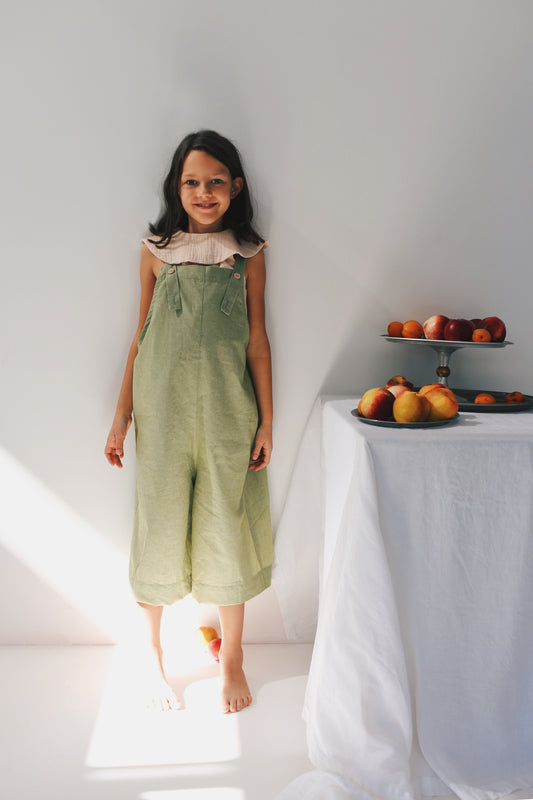 green dungarees with wide legs