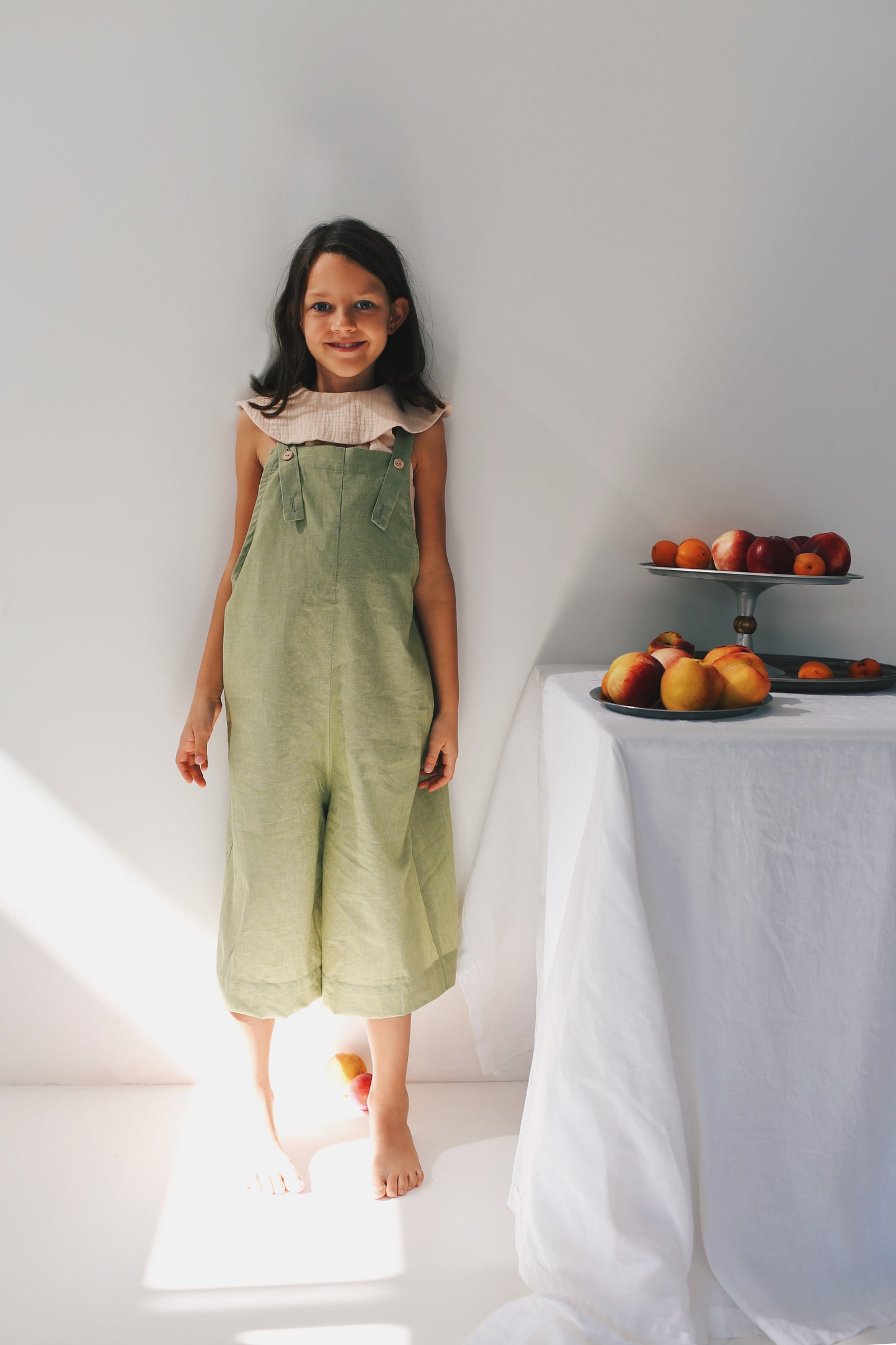 green dungarees with wide legs 