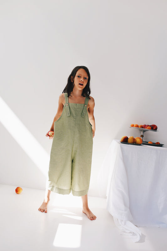 green dungarees with wide legs