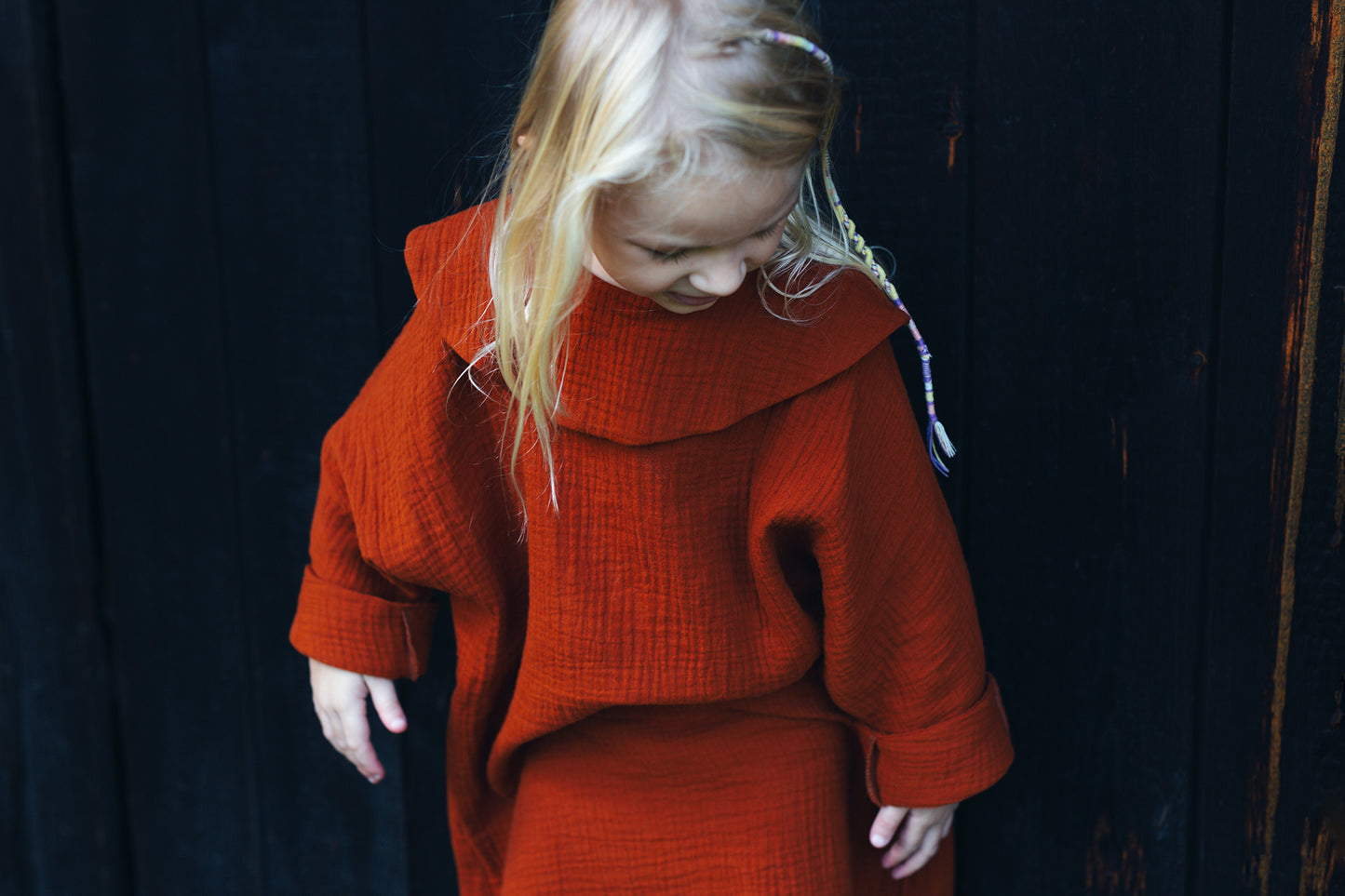 caramel dress with long sleeves with big, round collar